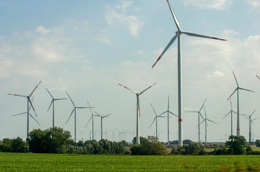 Large wind turbine in field